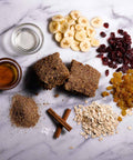 Vegan & Gluten-Free Breakfast Protein Bar with Ingredients including Bananas, Cinnamon Stick, Raisins