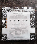 Vegan Gluten-free Chocolate Chip Cookie on Black Background Packaged
