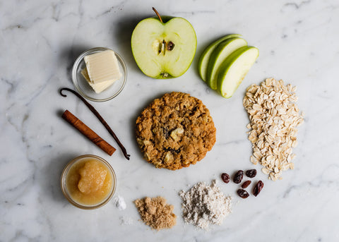 Vegan Gluten-Free Apple Oatmeal Cookie with Ingredients on Marble