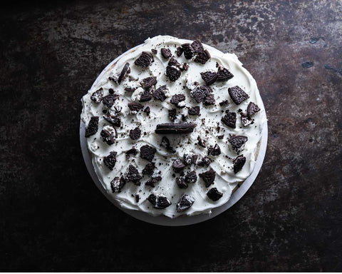 Vegan & Gluten-Free Oreo Cheesecake Top View with Black Background