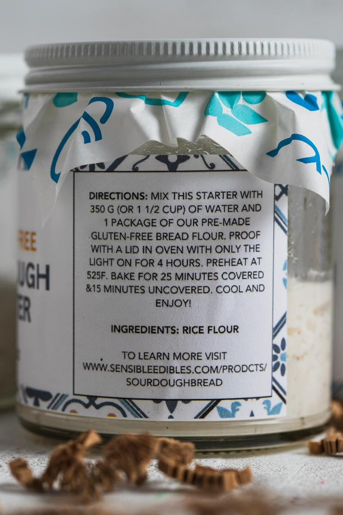 Jar of gluten-free sourdough starter with directions and ingredients label.