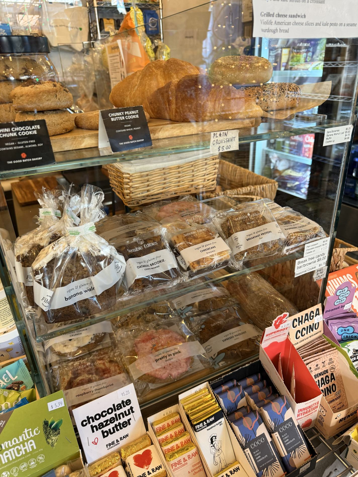 a variety of sensible edibles bakery vegan and gluten free baked goods in a bakery case