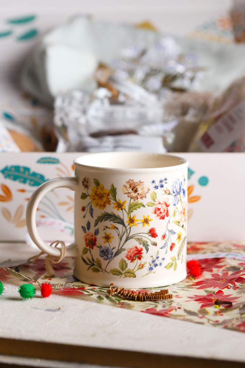 Floral patterned mug on a patterned surface