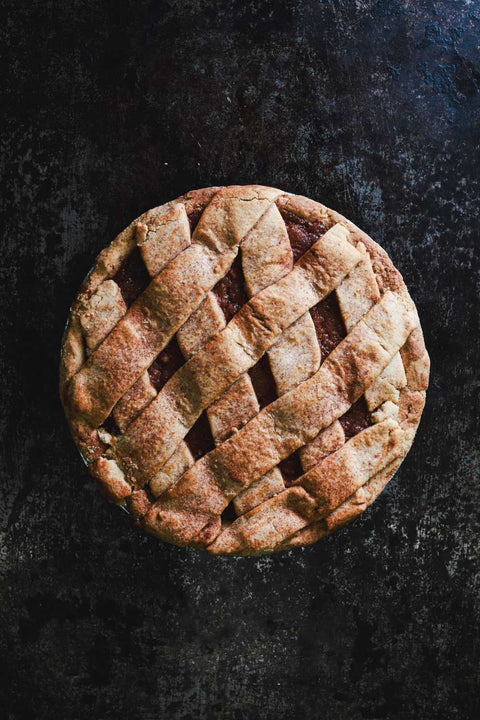 Vegan & Gluten-Free Lattice Apple Pie on Black Background