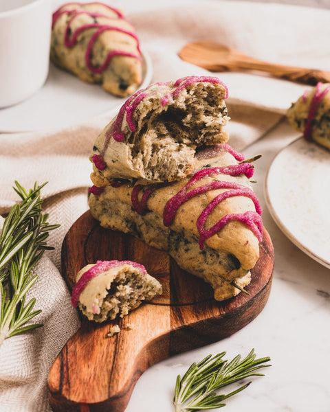 Vegan & Low-Sugar Blueberry Rosemary Scone on Wood board with Sprigs of Rosemary