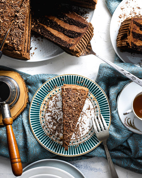 Sugar-Free Gluten-Free Chocolate Keto Cake Slice on a White and Green Plate with Fork
