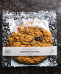 Vegan Gluten-Free Oatmeal Chocolate Chunk Cookie Packaged on White Plate