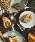 Vegan Gluten-Free Apple Pie Slices on White Plate, Wood Plate with Spoons