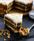 a bite out of a vegan carrot cake