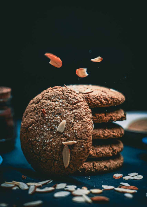 Salted Vegan gluten-free Chocolate Chip Cookie on black background