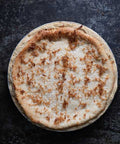 Vegan & Gluten-Free Coconut Custard Pie on Black Background
