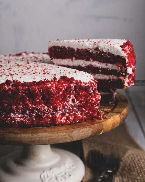 Vegan & Gluten-Free Red Velvet Cake Slice on Cake Stand